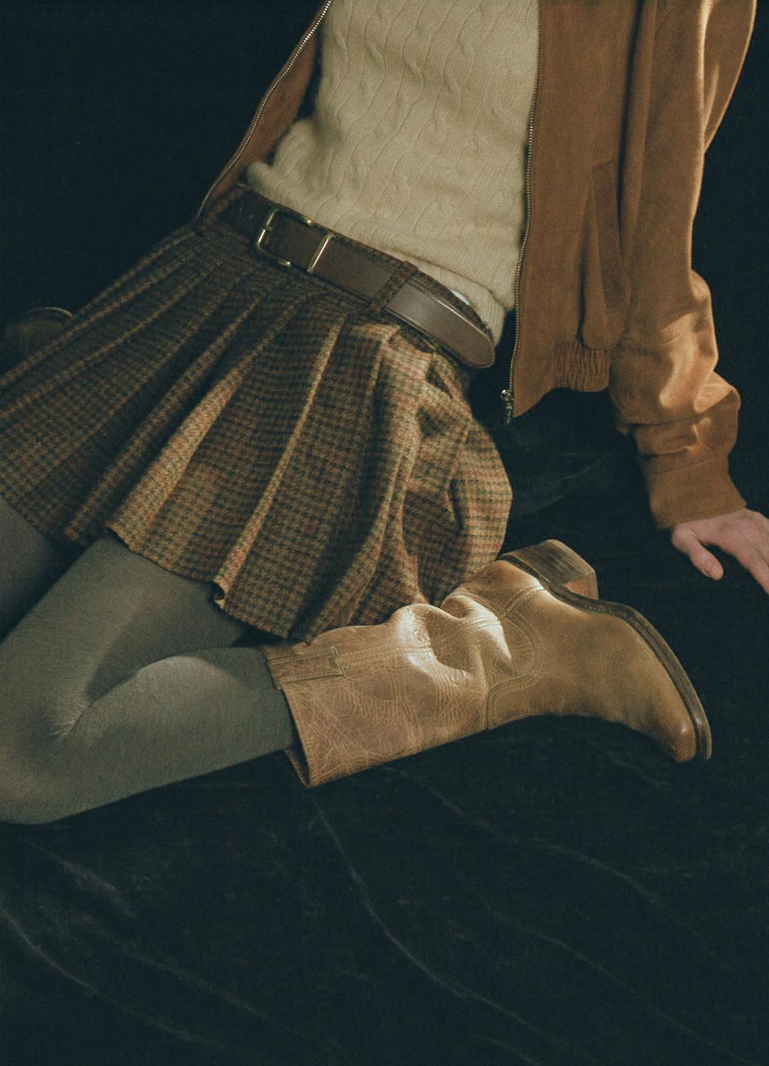 CHER LOW-RISE PLEATED MINI SKIRT