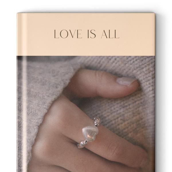 Love is all, silver ring