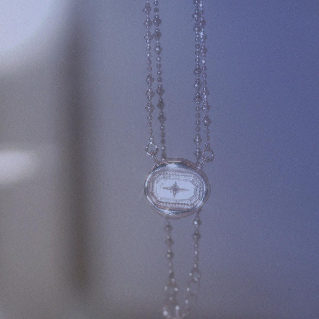 trace in daily universe necklace. twinkle setting