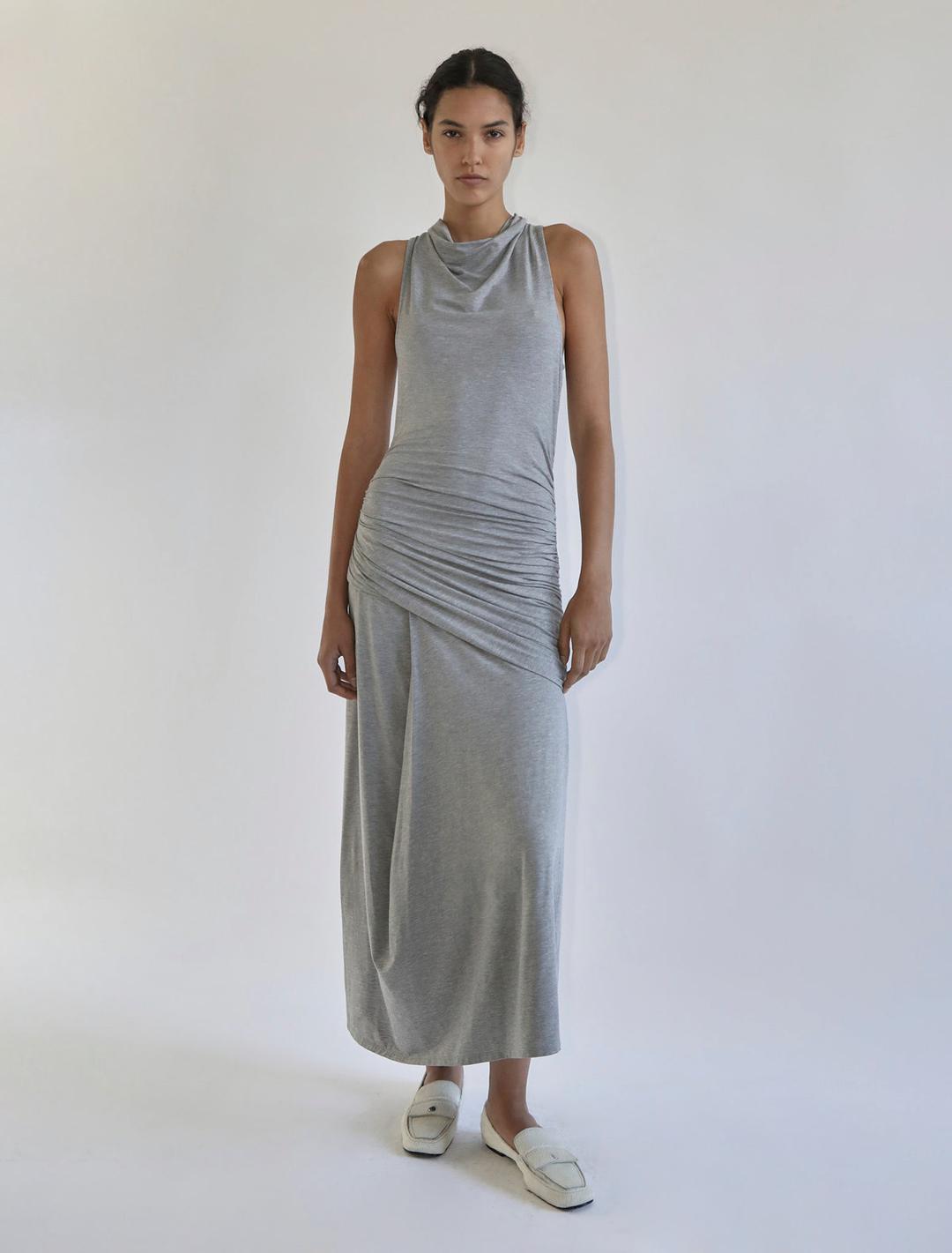 LECH-Long dress with a draped neckline, gathered sides, and an asymmetrical flared hem