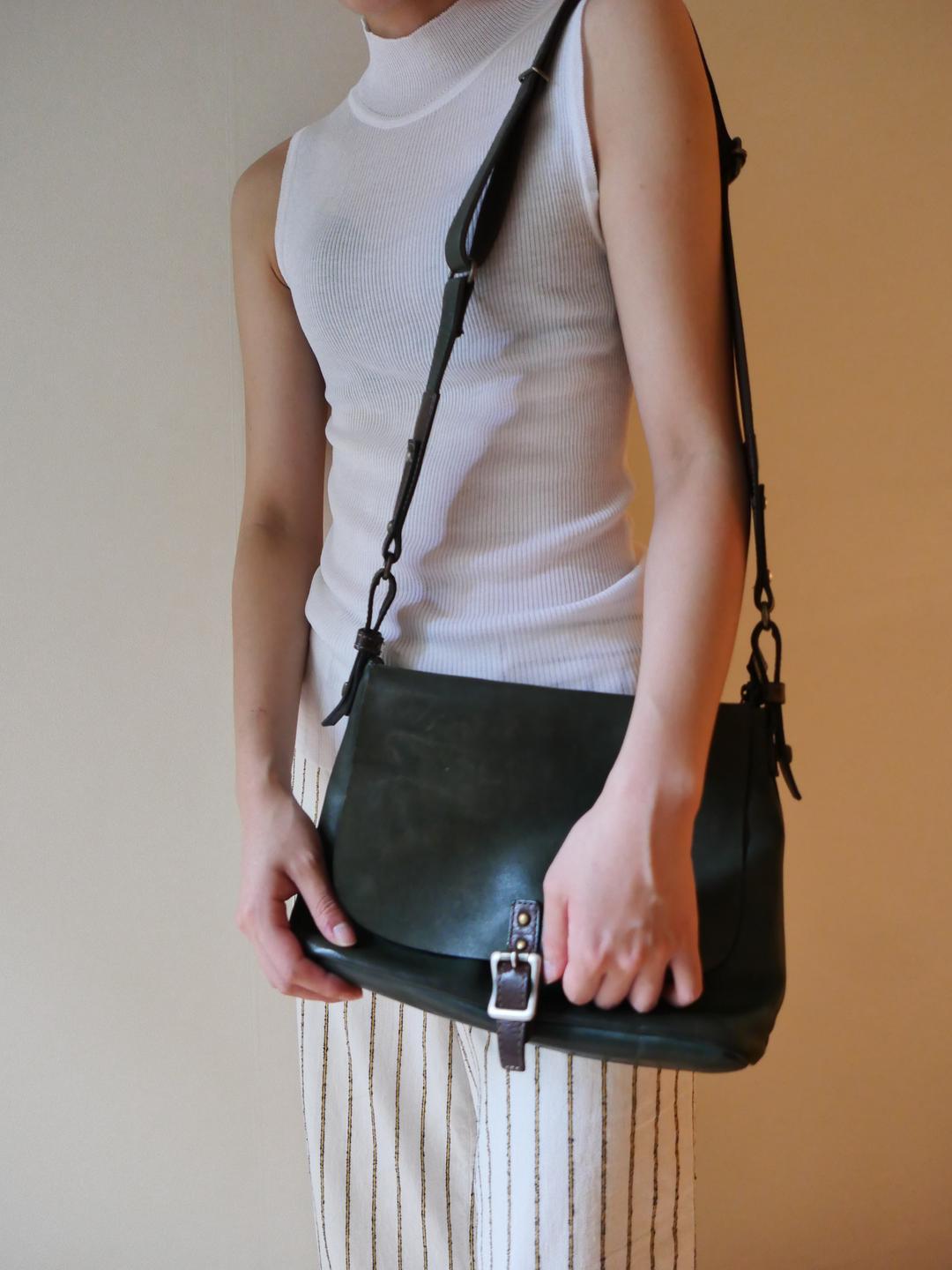 green leather bag