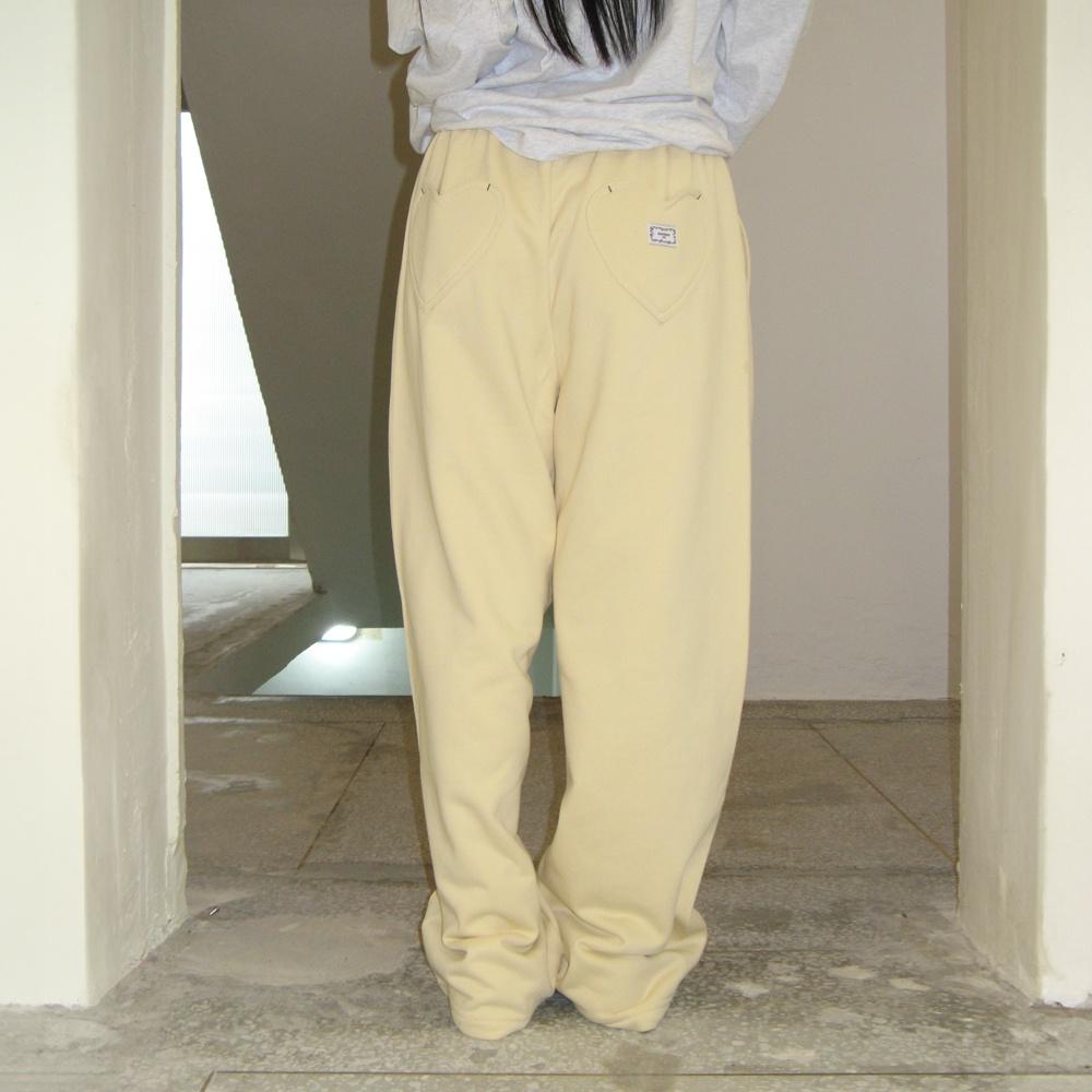BACK HEART STITCH POCKET SWEAT JOGGER PANTS CREAM YELLOW