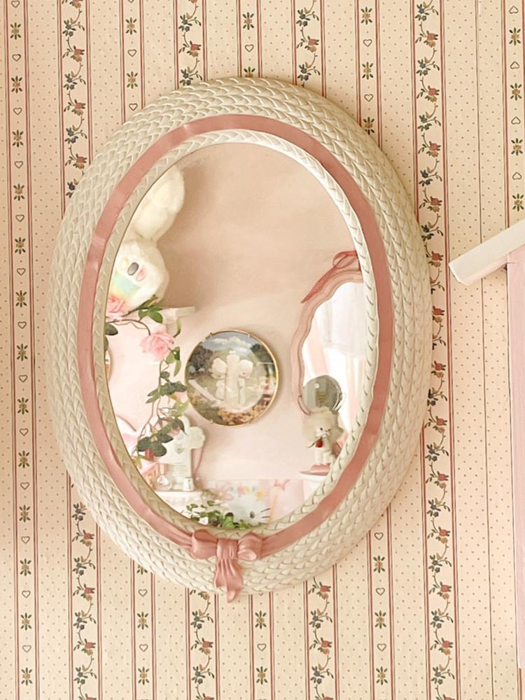 Pink ribbon oval mirror