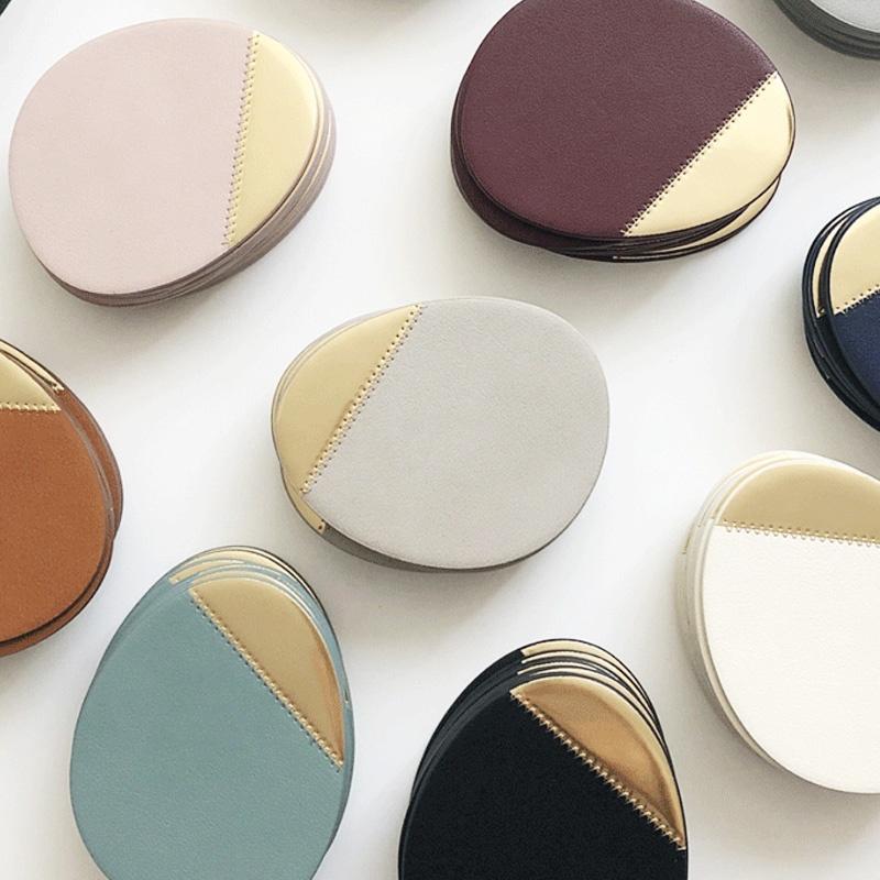 르엔미 조약돌 골드 가죽컵매트