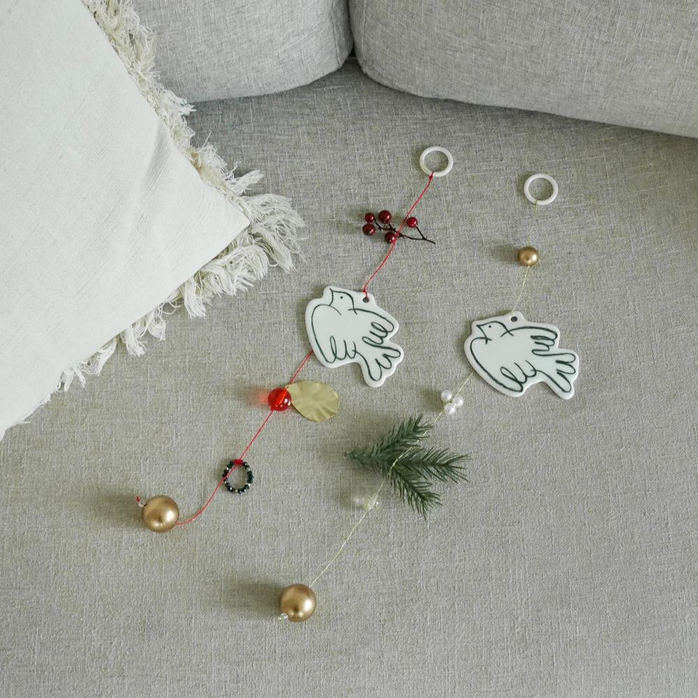 green bird mobile (green/red)