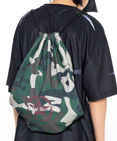 XTA028 미누의 카모 스트링 백 (CAMO)