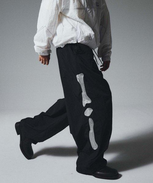 스켈레톤 나일론 팬츠 블랙