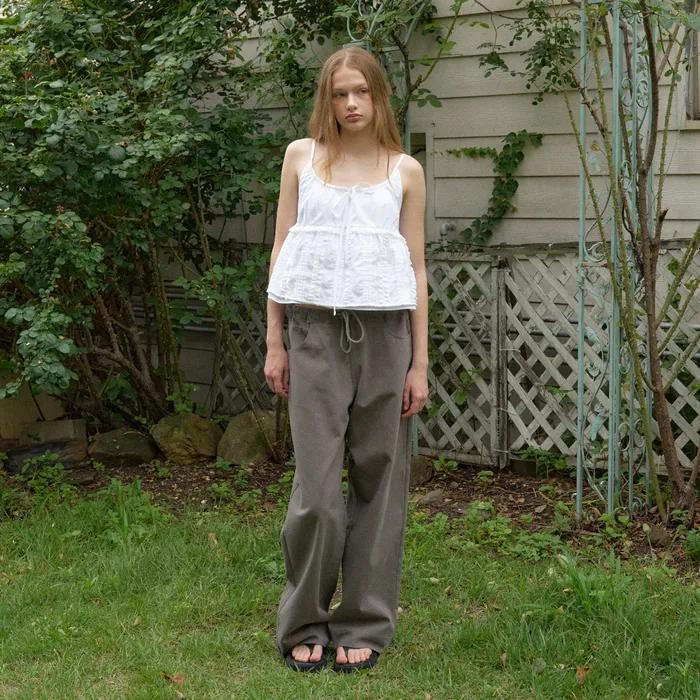 worn cotton pants (brown)