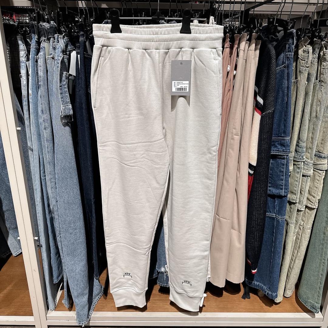 어콜드월 아이보리 자수 로고 디테일 스웻팬츠 조거팬츠 | 후루츠패밀리
