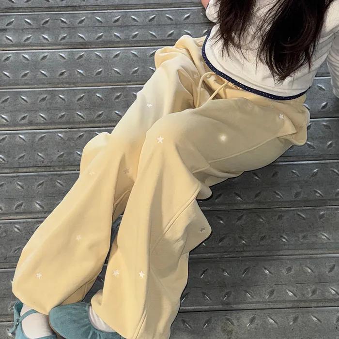 STAR EMBROIDERY SWEAT JOGGER PANTS CREAM YELLOW