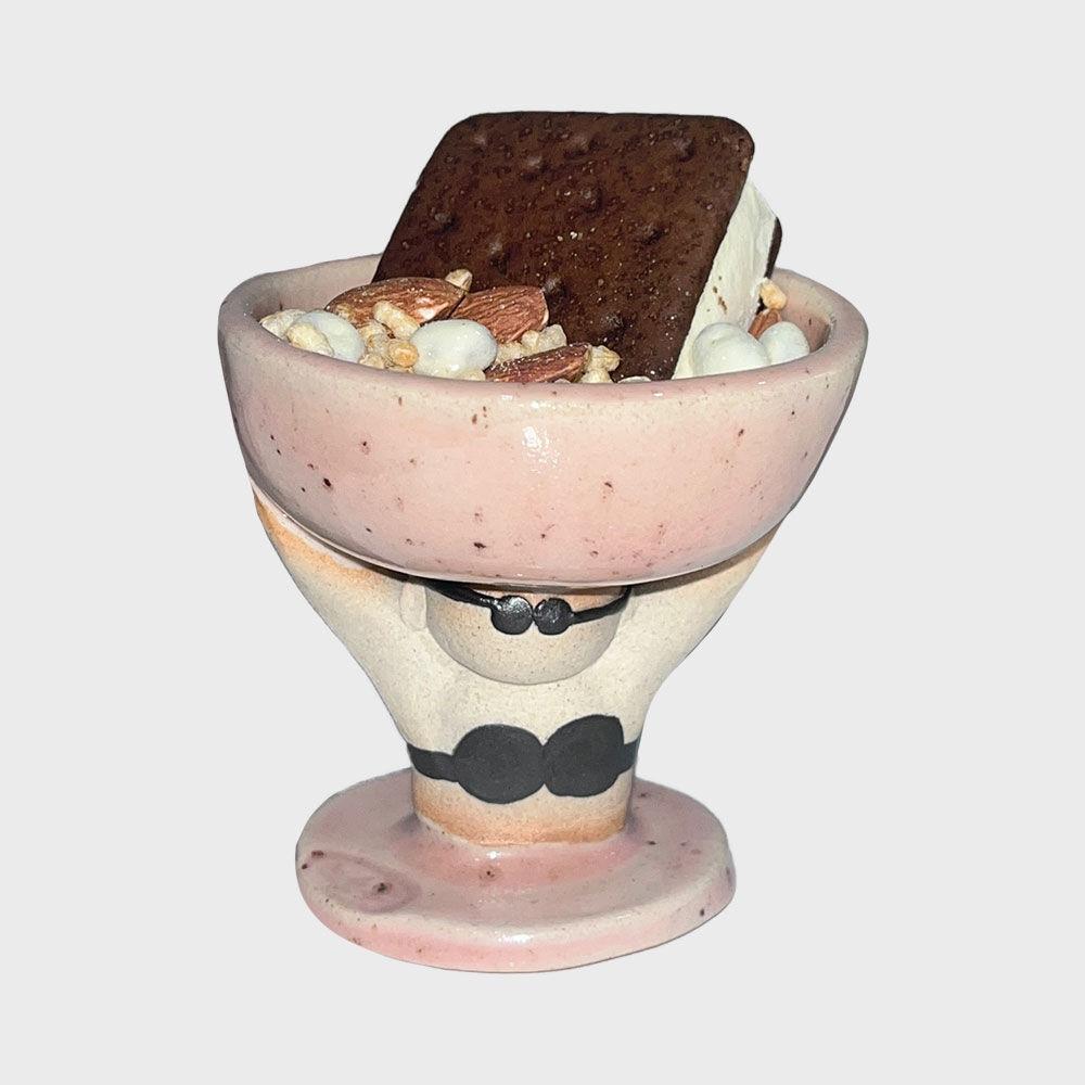 holding a yogurt bowl