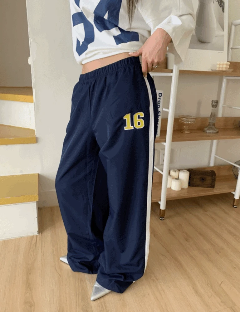 넘버 사이드 배색 밴딩 나일론 와이드 팬츠