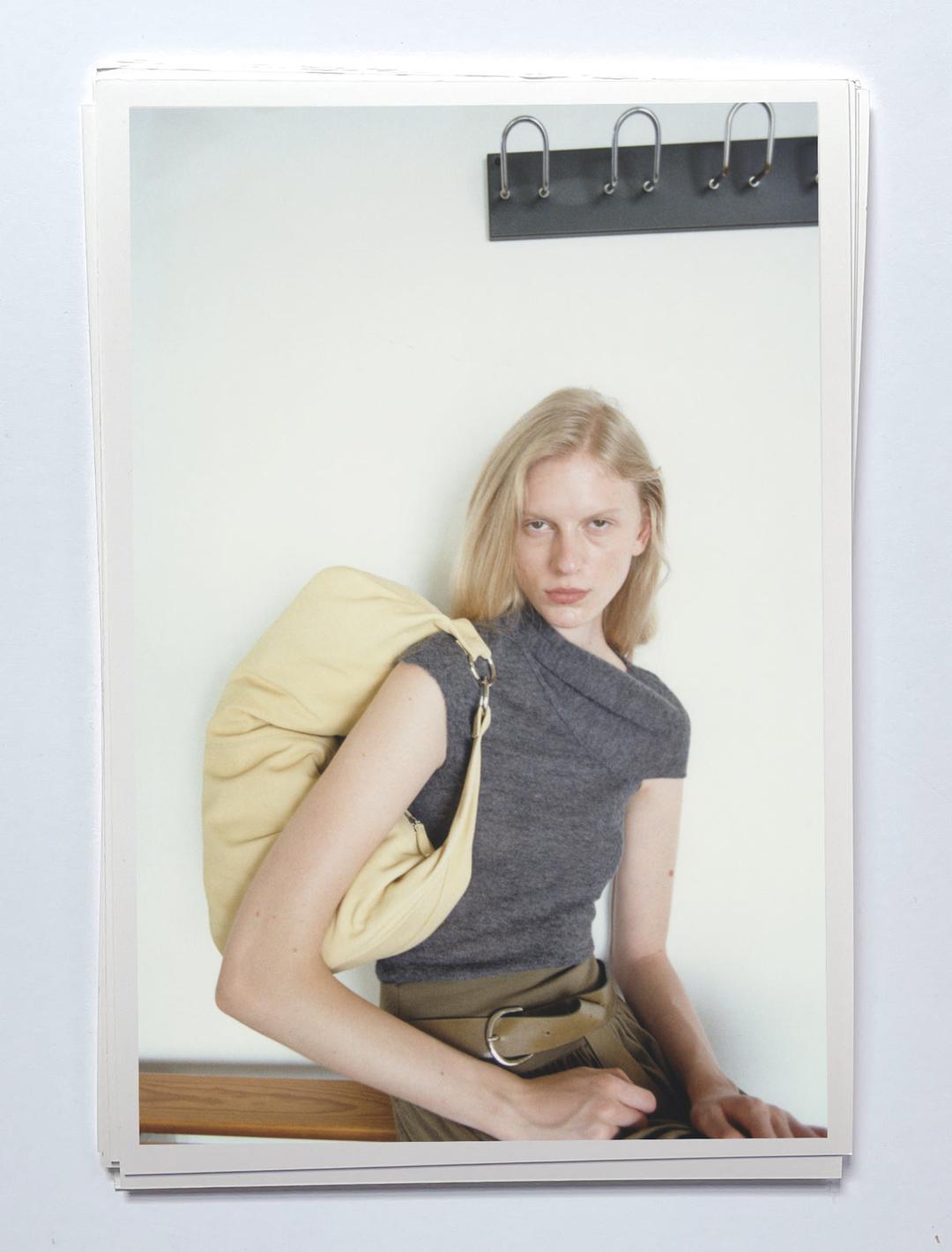 DRY-Yellow elongated, wrap-around hobo-style shoulder bag