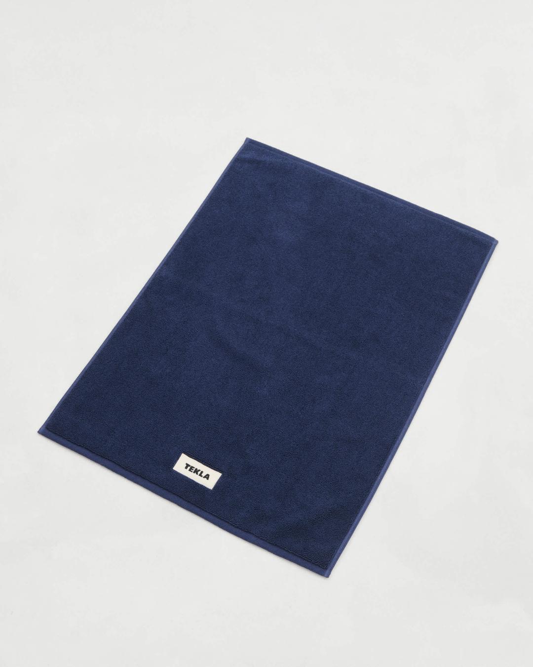 Navy bath mat