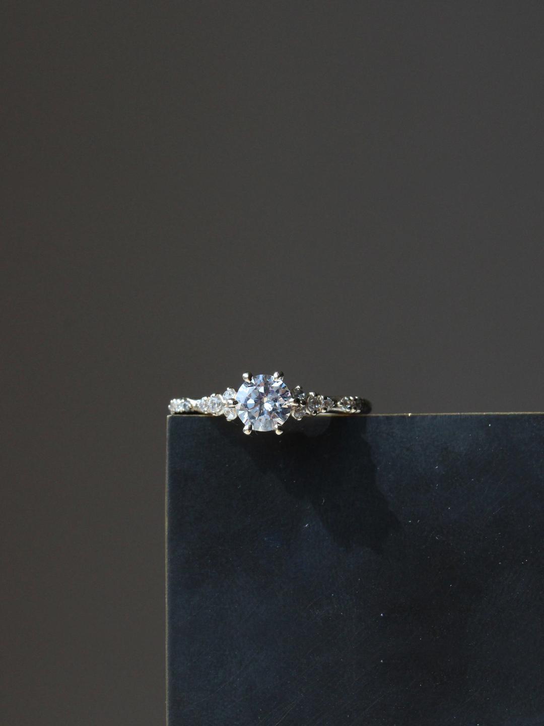 diamond bud cluster ring: GIA 0.5ct.