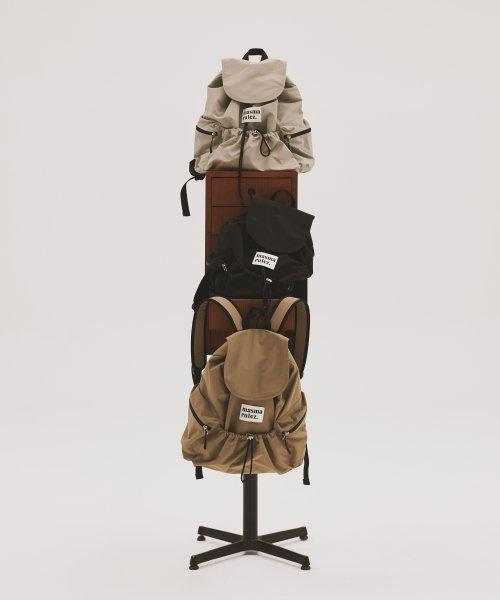 String flap backpack _ Black