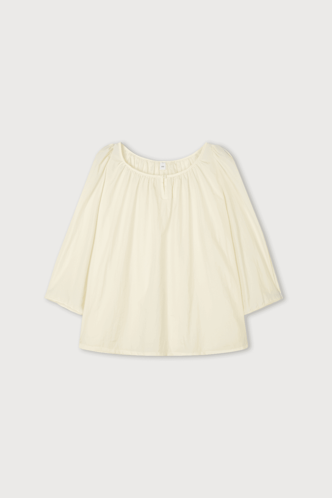 GLOSSY ROUND NECK BLOUSE