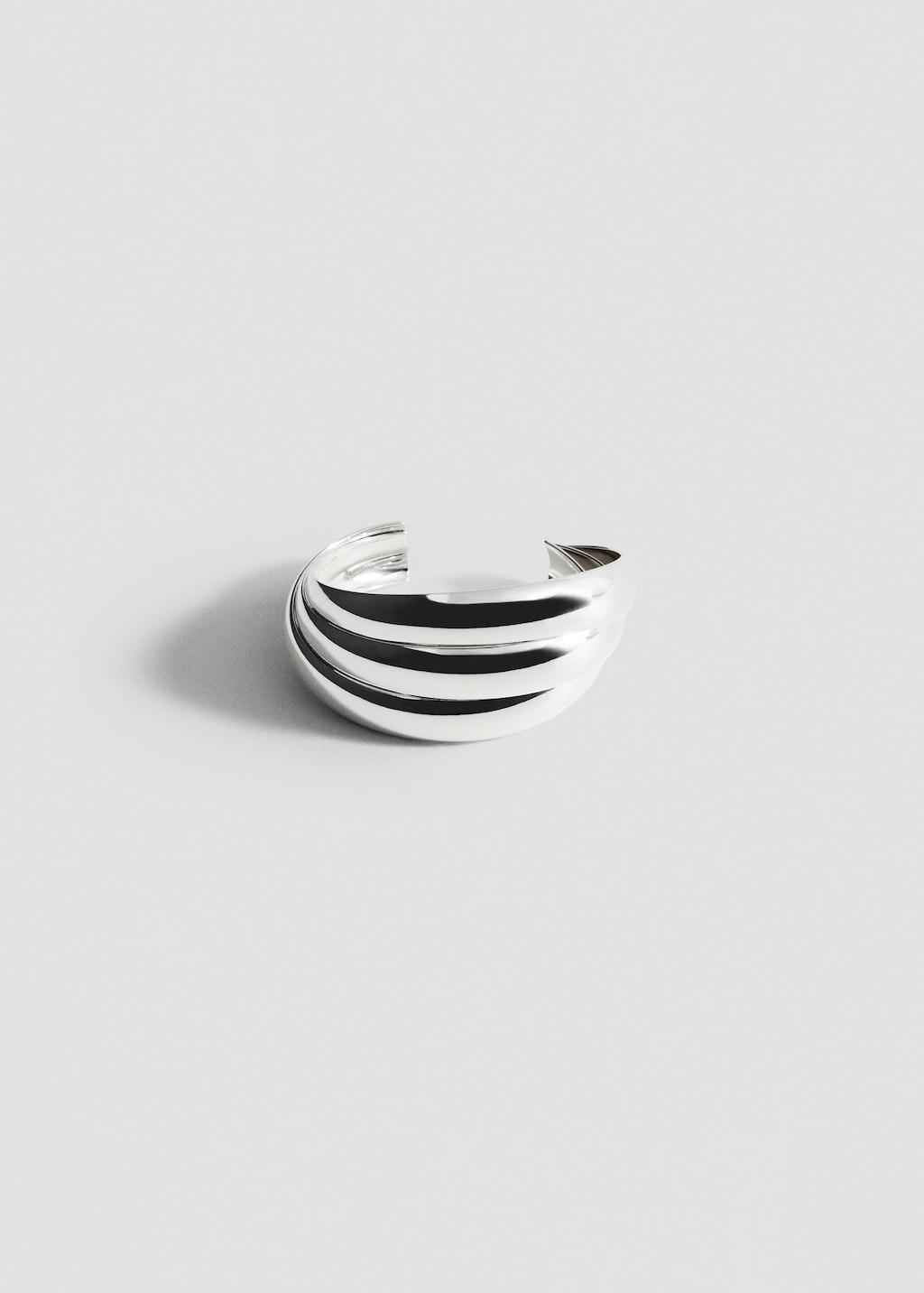 Rigid bracelet with relief