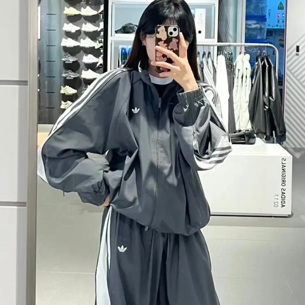 아디다스 ADIDAS 여성 아딜레늄 아딜레니엄 3 루즈핏 트랙탑 저지 바람막이 자켓 그레이 JY8879