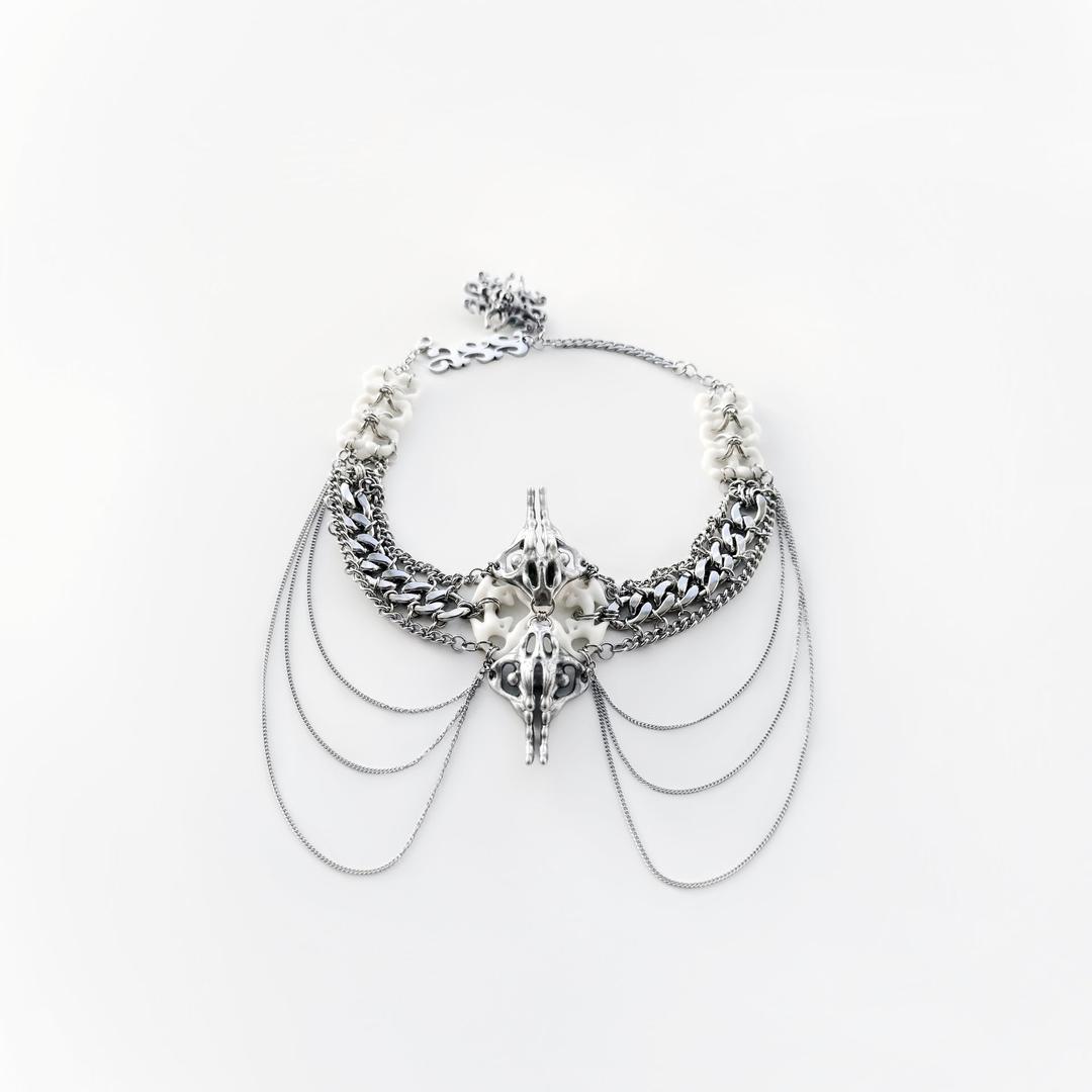 * 886 * White pelvis bone necklace