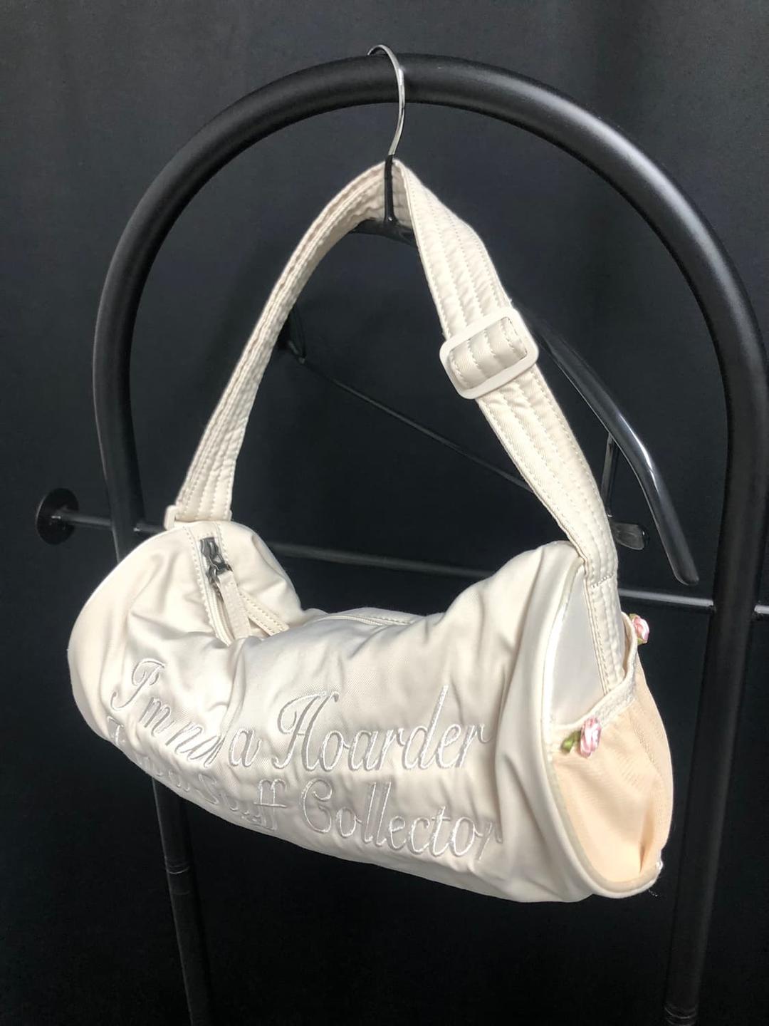 스컬프터 로즈 미니 더플백 아이보리 | 후루츠패밀리