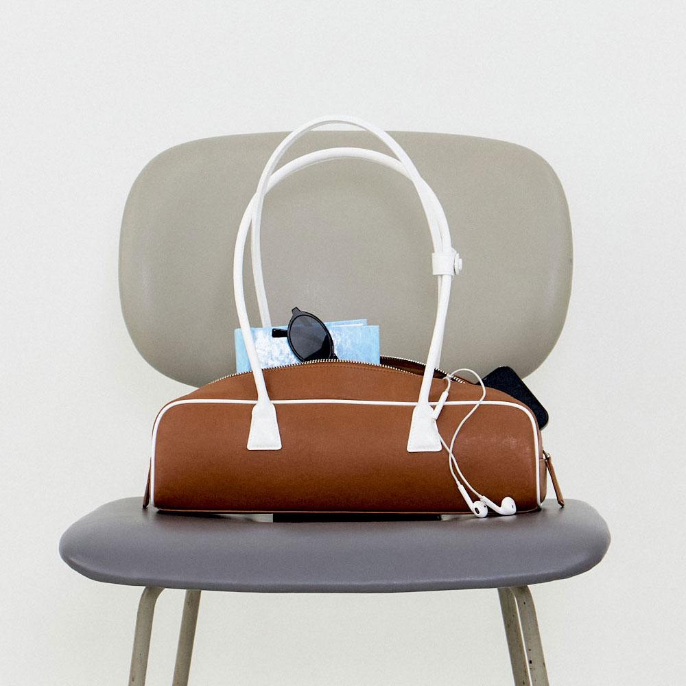 25 Spring_ Brown Piping Baguette Bag