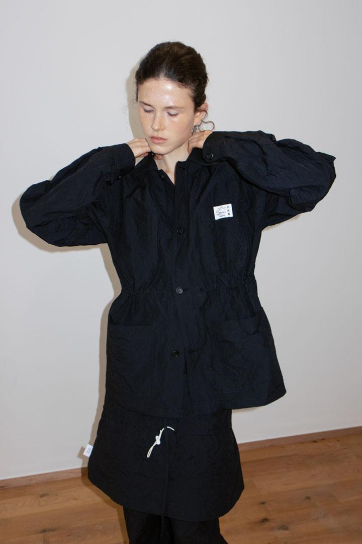 (SUSUMU) RECYCLED WORK WINDBREAKER | black