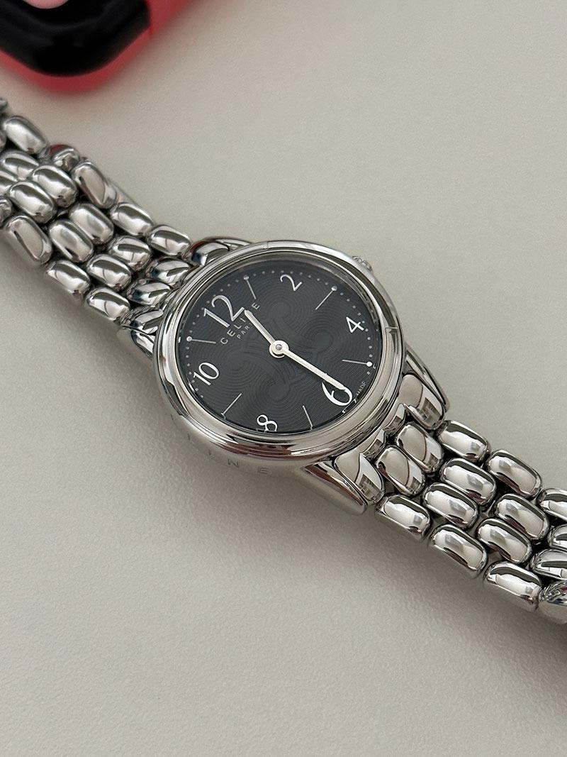 CELINE round case black logo dial steel watch