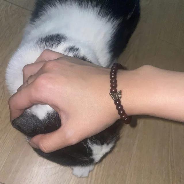 [오리엔탈]나비 나무구슬 팔찌