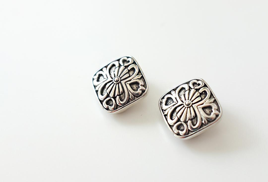 Rhombus silver tone pattern vintage clip earrings