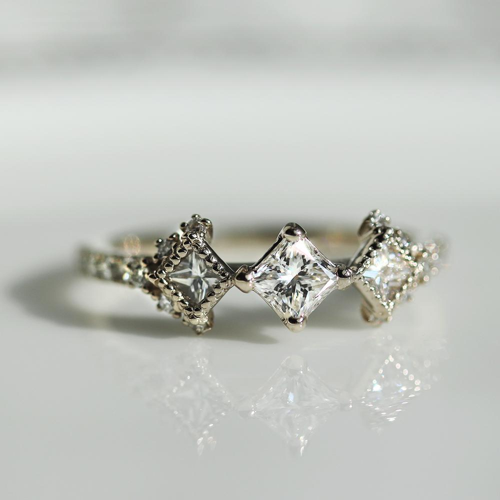 0.3ct princess cut diamond bouquet ring