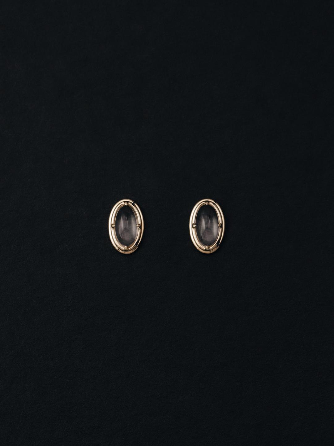 double bezel studs. -clear quartz
