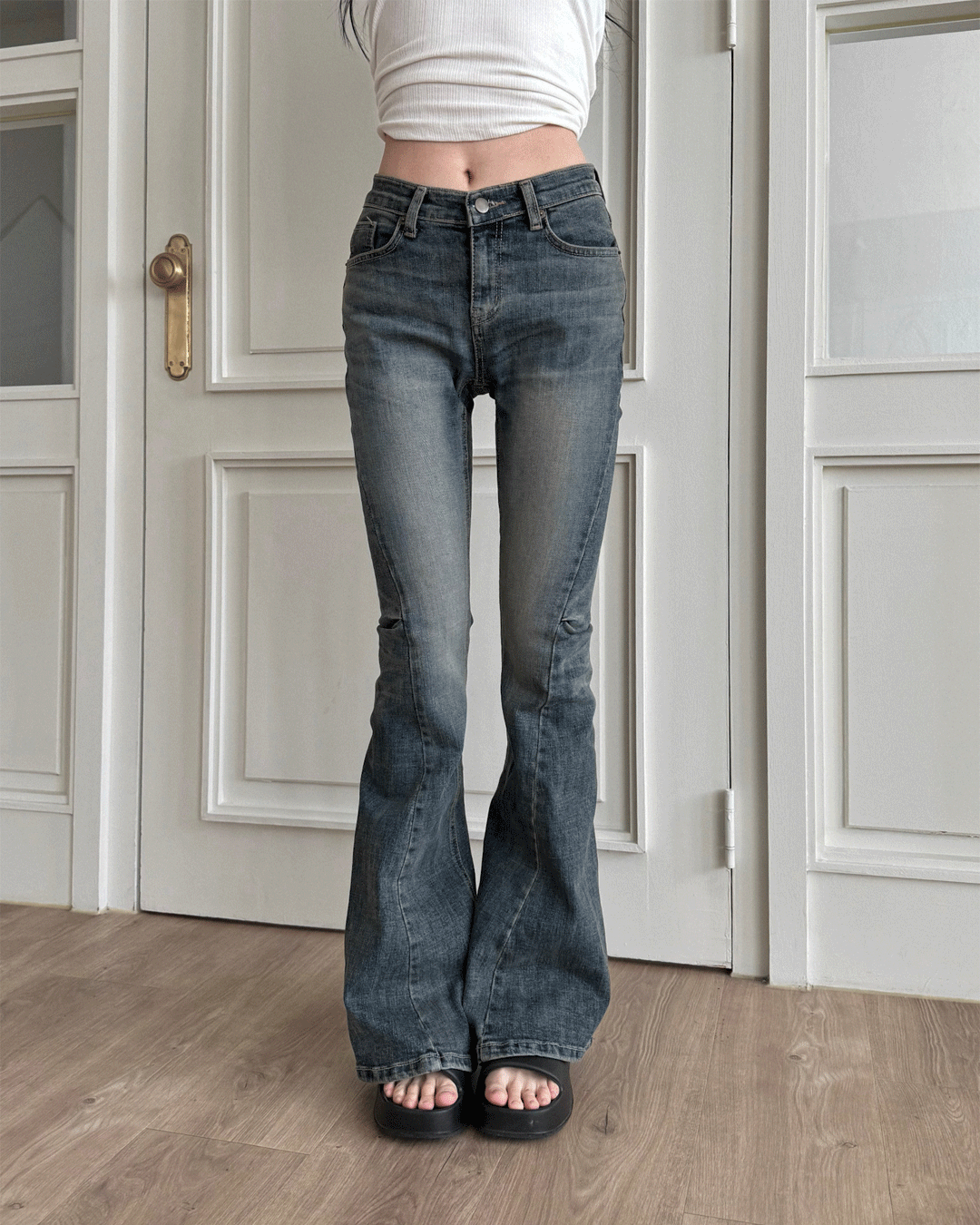 High boots cut denim
