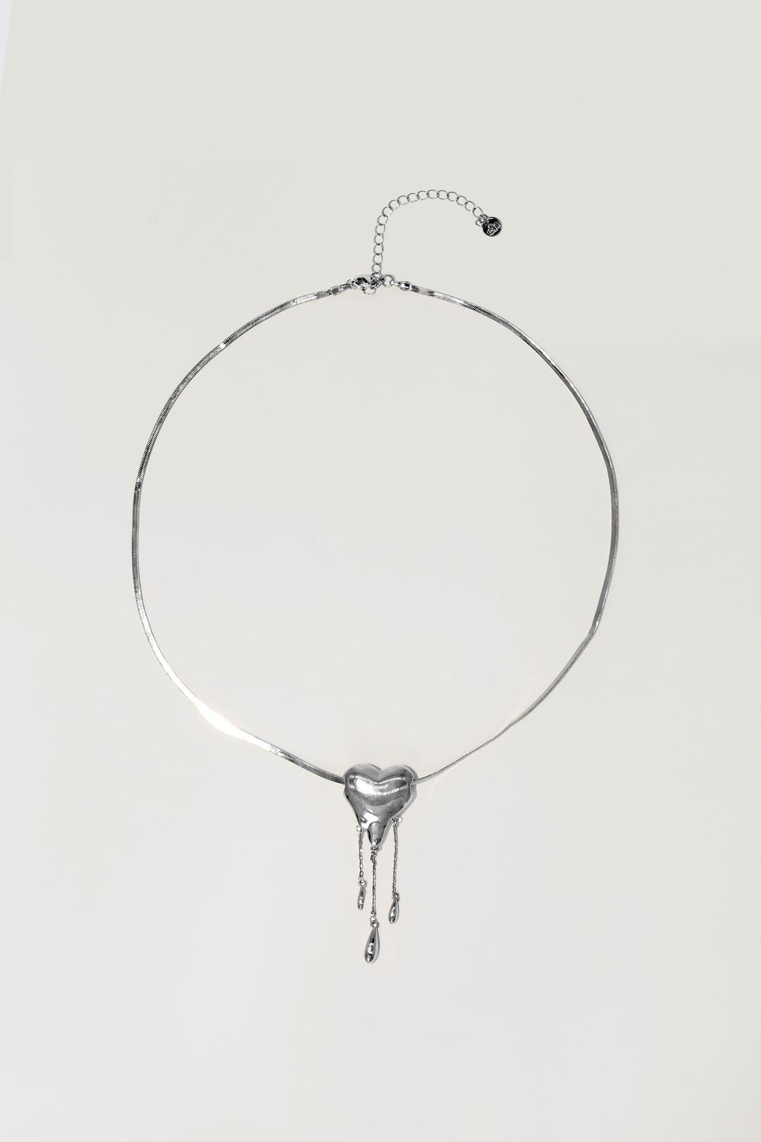 Venom's Golden Drip Heart Necklace in Silver