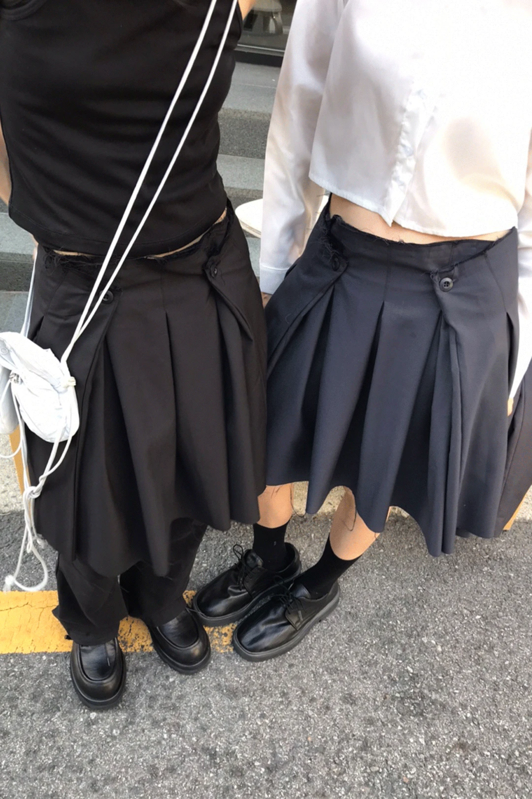 UNTAMED PLEATS SKIRT