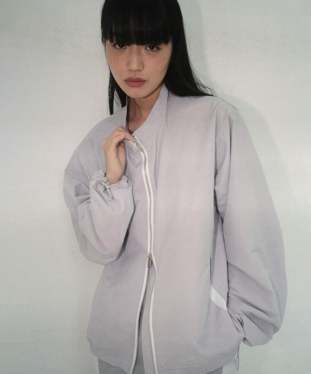 Oval pocket nylon jacket