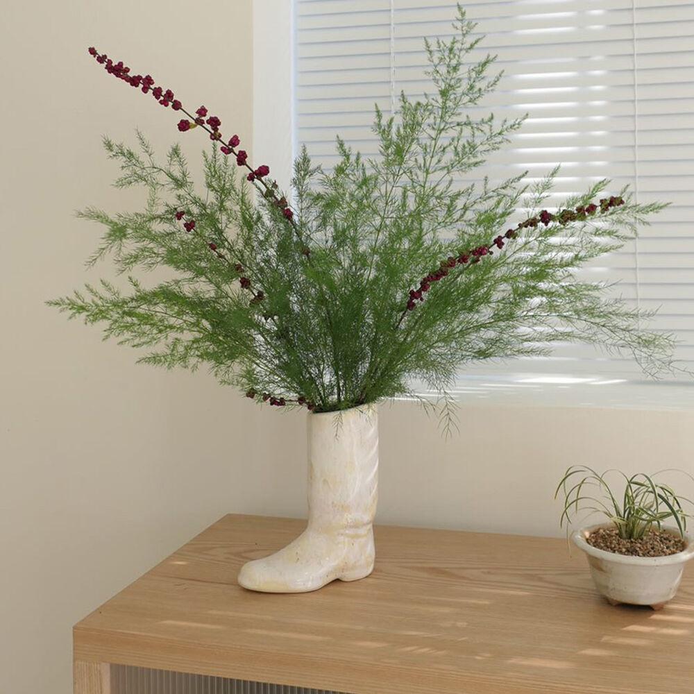 boots vase ivory