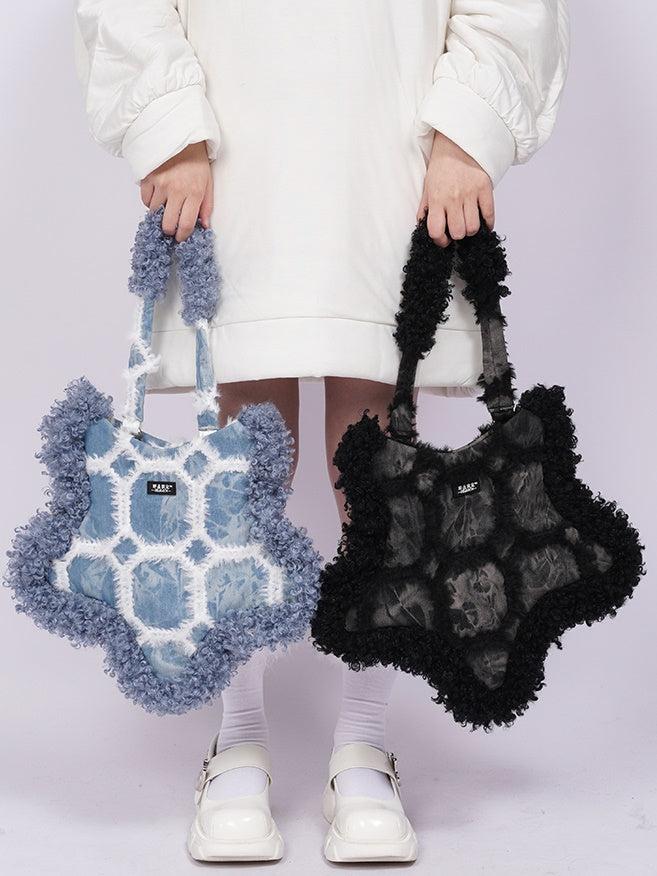 별 하나의 숄더백을 별표