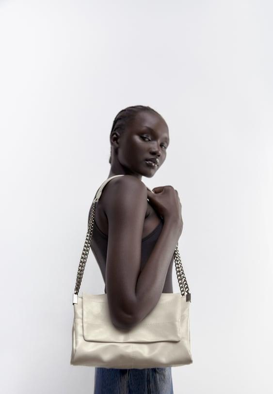 ROCKER SHOULDER BAG WITH FLAP
