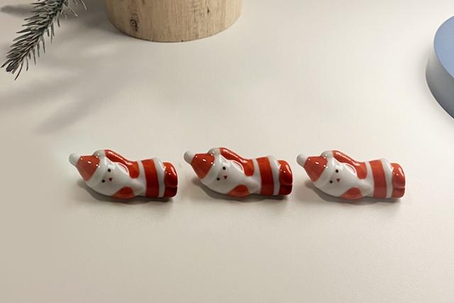 크리스마스 소품 / 옆으로 산타 젓가락 받침 1p