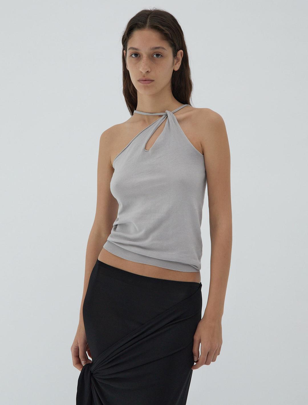 NOMI-Sleeveless top with a crossover neckline