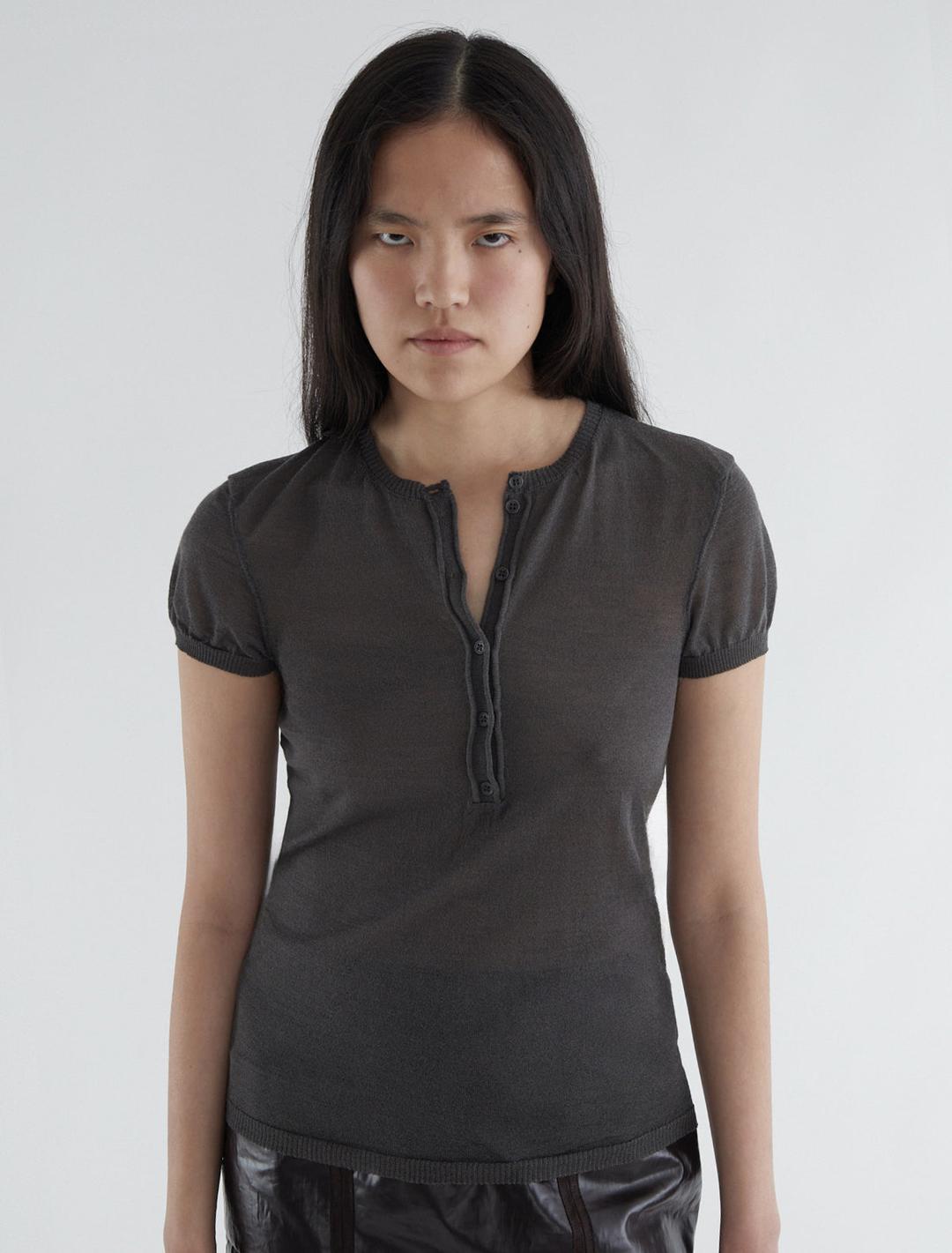 DON-Delicate, slightly sheer short-sleeve top with baker neckline