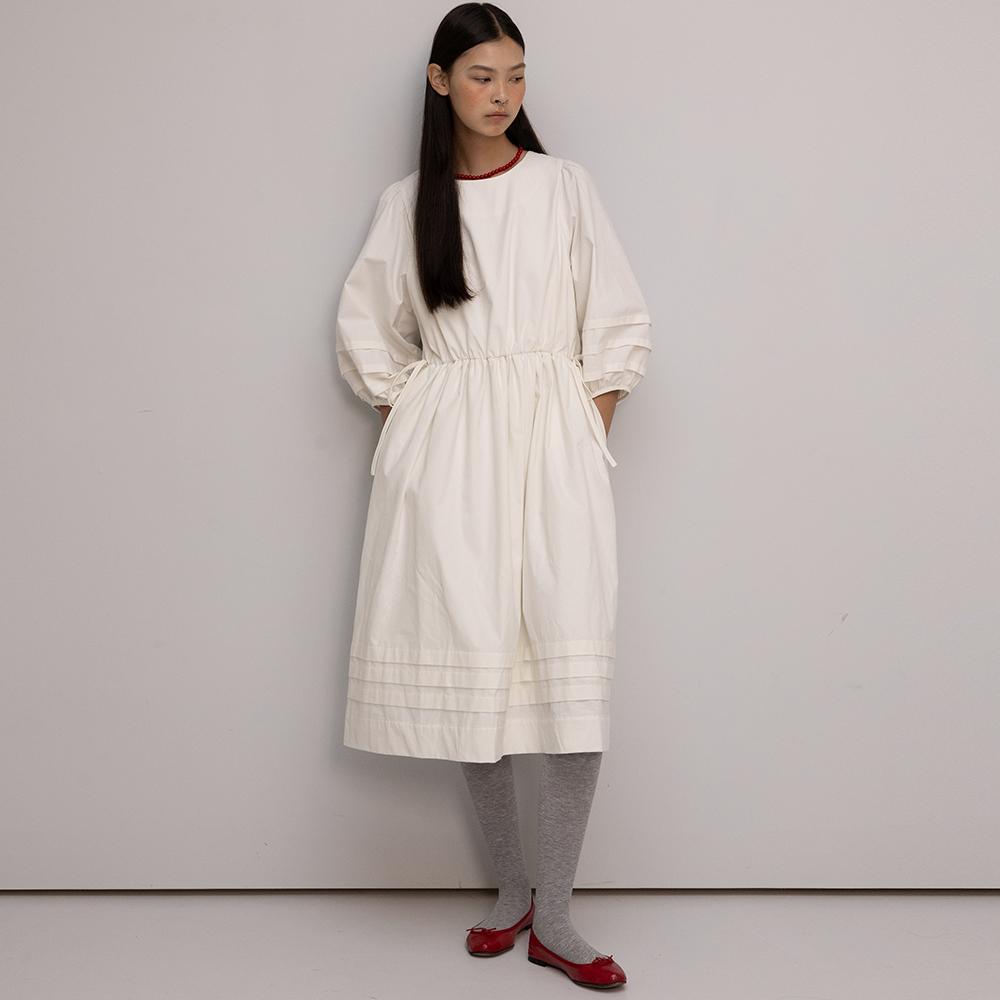 Soft peach cotton pin tuck dress in ivory