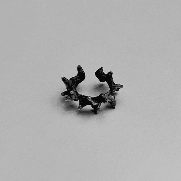 DISTORTED STAR EAR CUFF