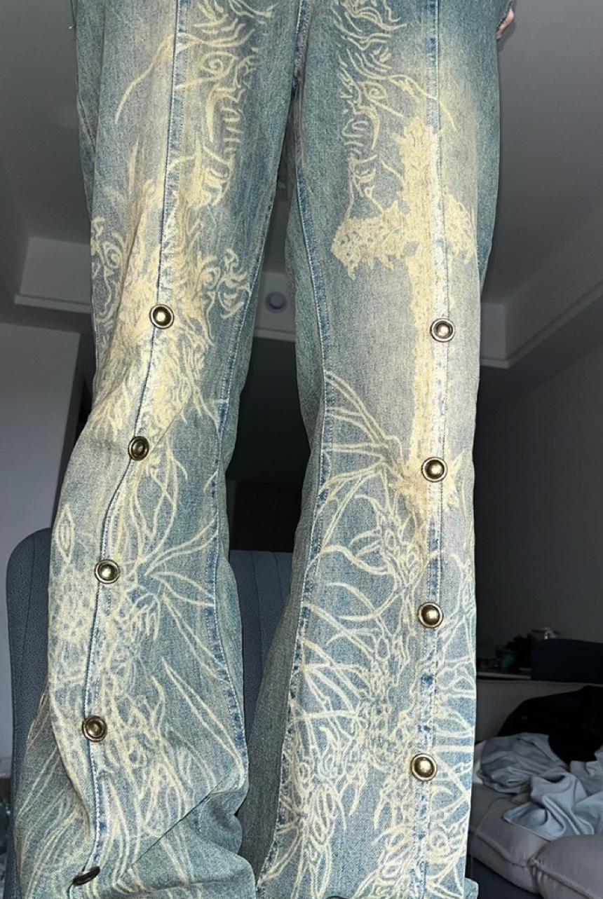 Elyoya washed distressed tattoo jeans