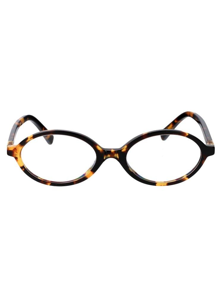 Miu Miu Eyewear Oval Frame Glasses