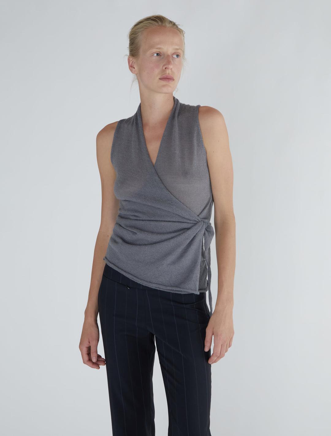 SANS-Grey sleeveless wrap top with a side loop to tie the outer layer
