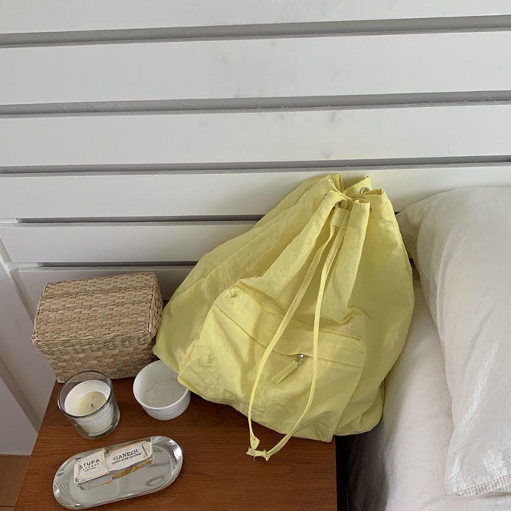 실키 데일리 포켓 스트링 백팩