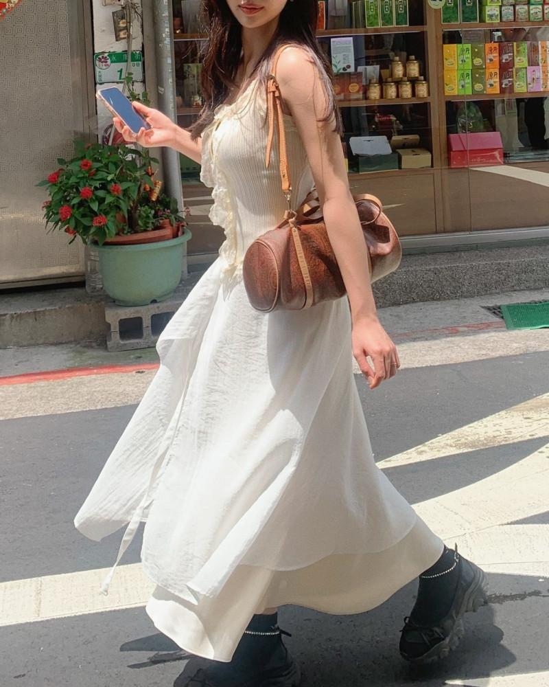 네이브 레이어드 버튼 랩 스커트