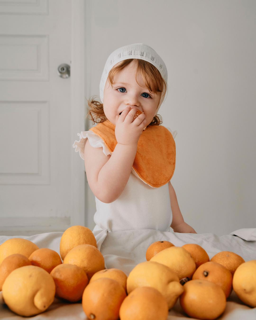 REVERSIBLE COTTON BIB _ orange beige